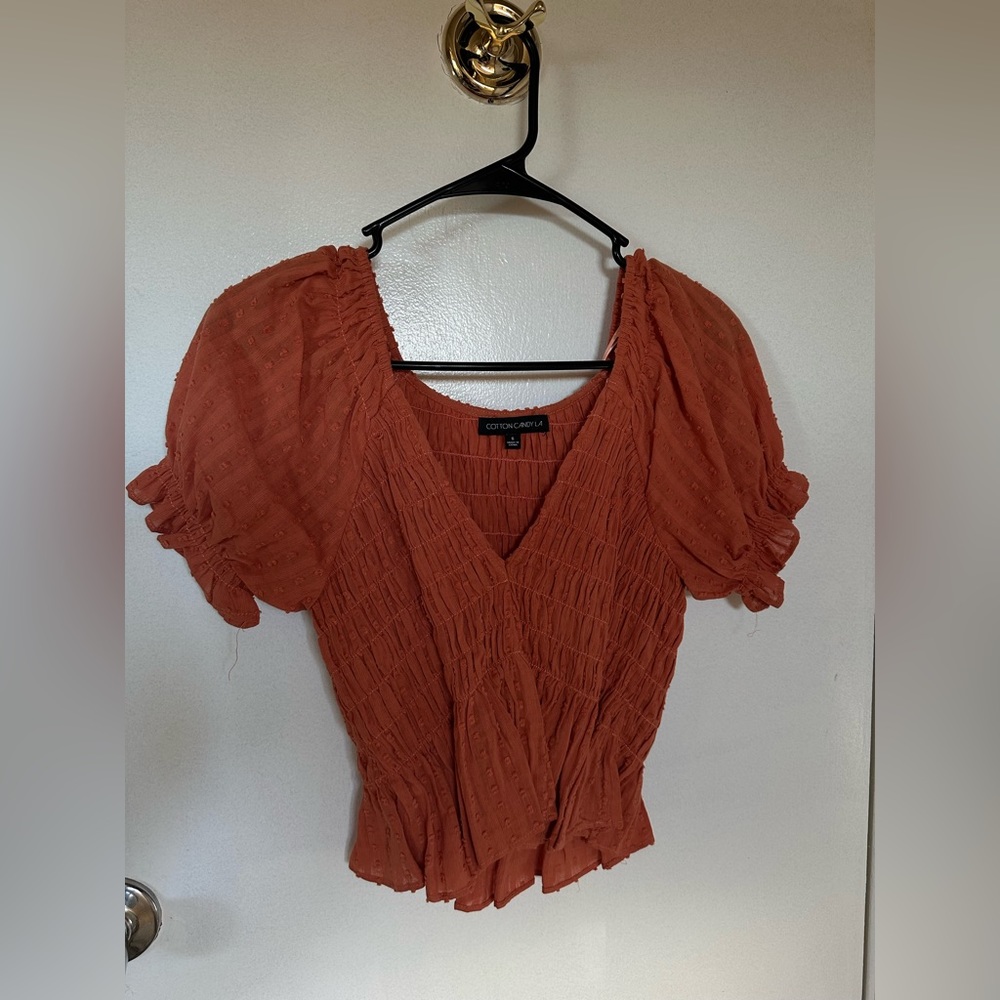 Orange v neck shirt